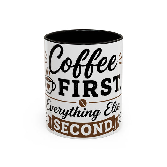 White ceramic coffee mug with black interior featuring “Coffee First Everything Else Second” funny coffee quote design