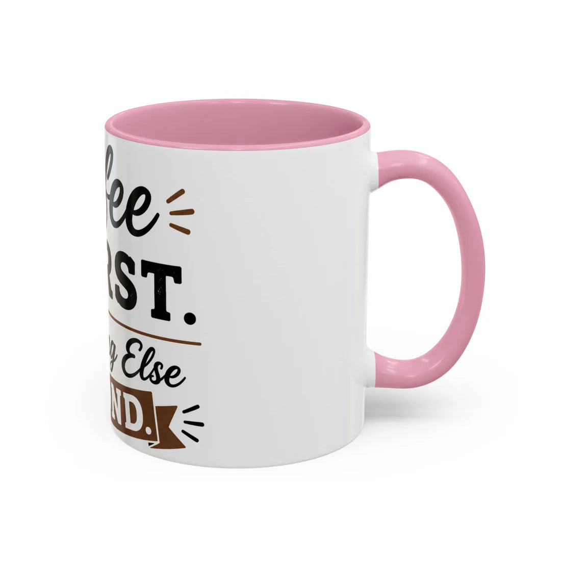 White ceramic coffee mug with pink interior and handle featuring Coffee First Everything Else Second bold typography design