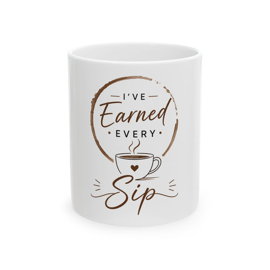 White ceramic coffee mug featuring “I’ve Earned Every Sip” with clean minimalist coffee design front view