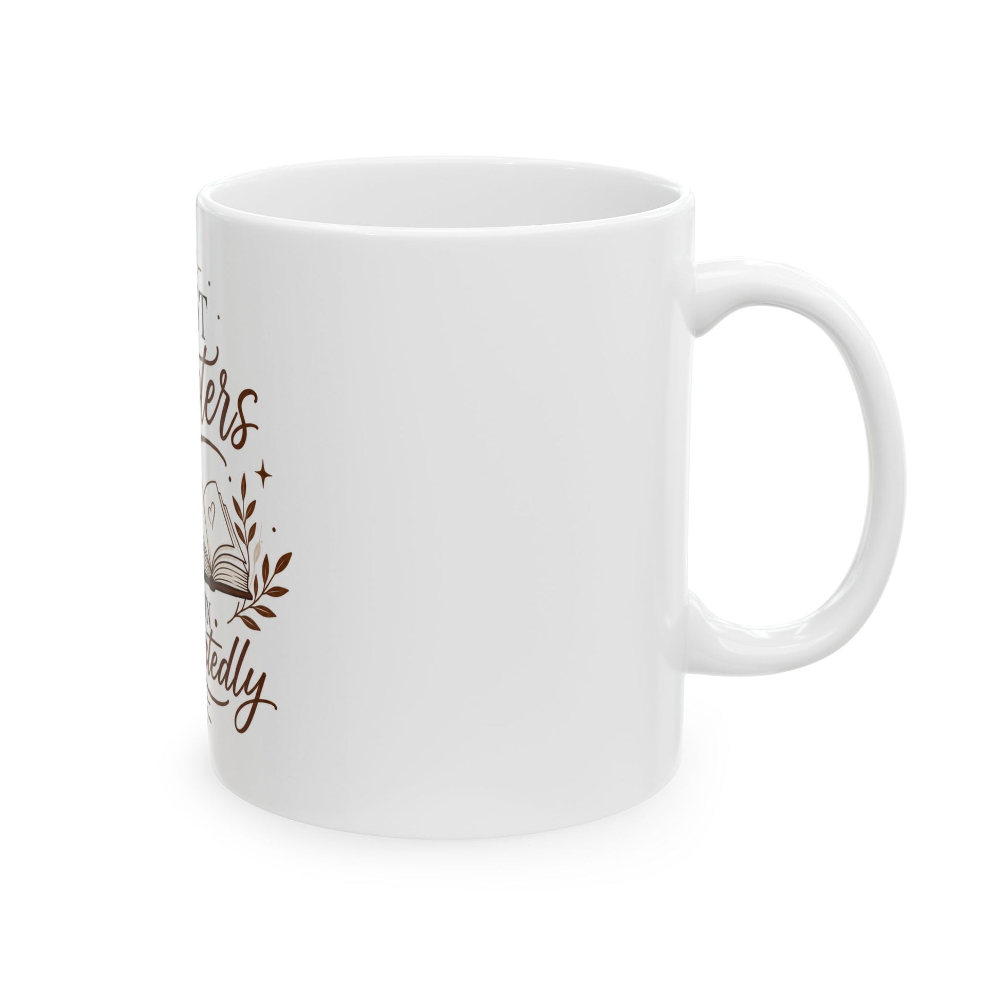 Right side view of inspirational black coffee mug with The Best Chapters Begin Unexpectedly quote